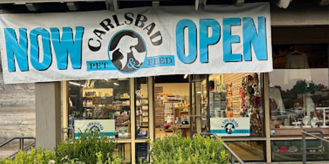 Storefront of Carlsbad Pet & Feed, host of dog teeth cleaning in Encinitas, California by Qualified Pet Dental.