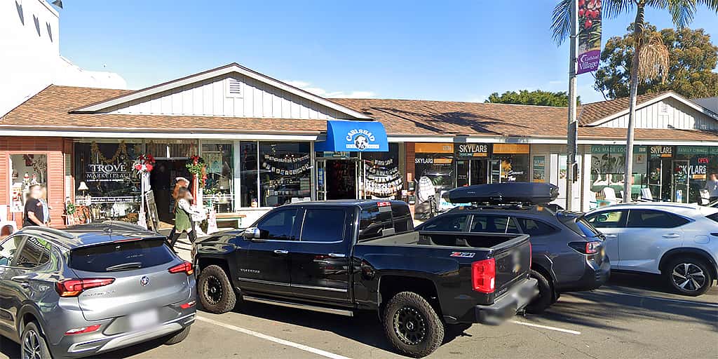 Storefront of Carlsbad Pet and Feed in Carlsbad Village, host of dog teeth cleaning in Carlsbad, CA by Qualified Pet Dental.
