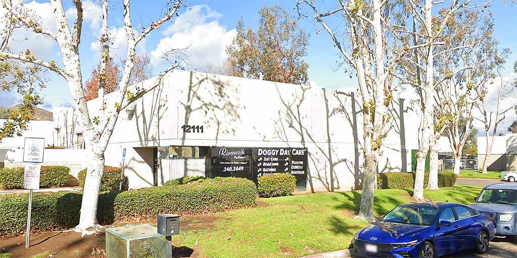 Storefront of Riverwalk Pet Resort in Riverside, California, host of dog teeth cleaning by Qualified Pet Dental.